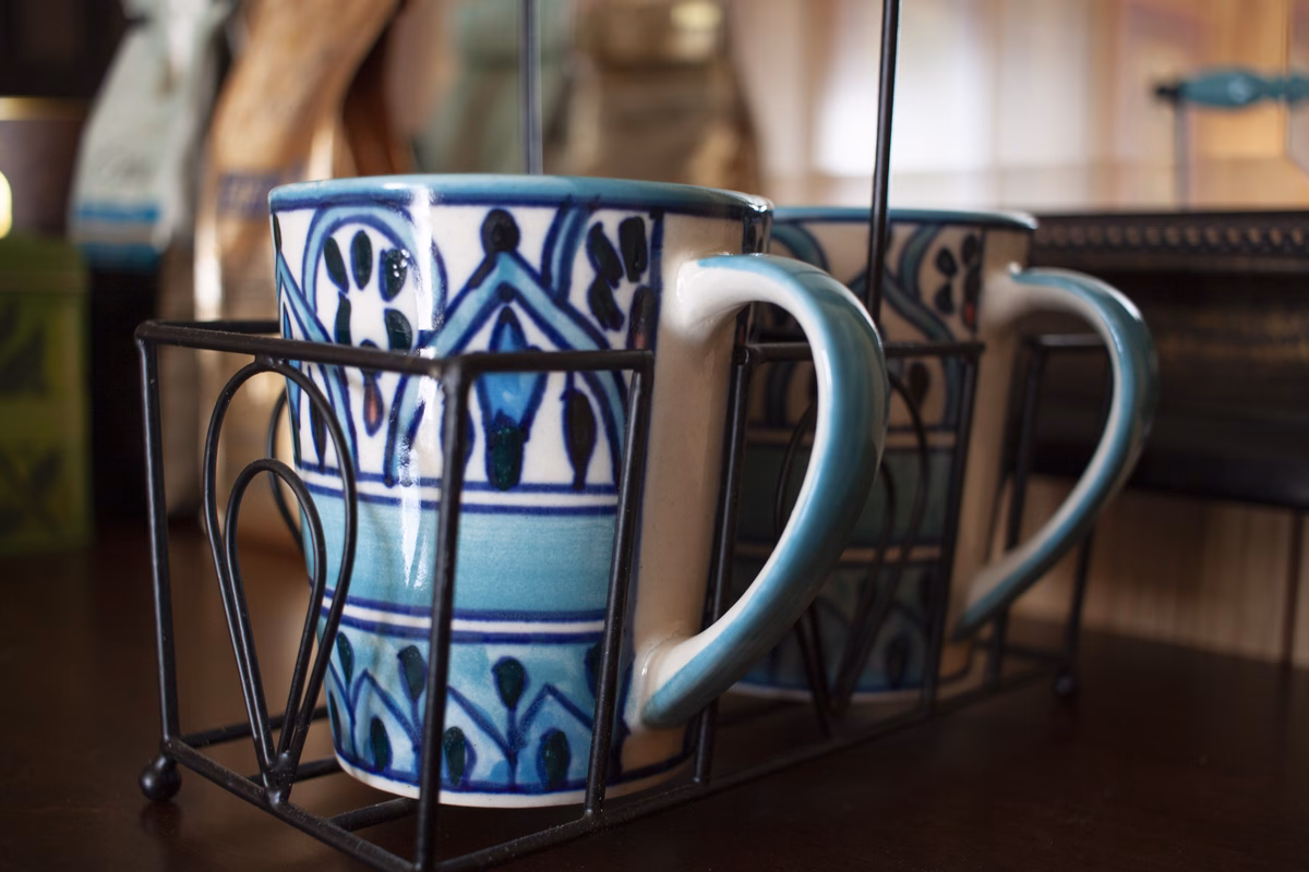 Coffee cups ready on a shared table in a SILK Homes property