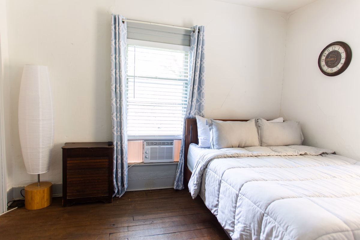 Bright furnished bedroom in a real SILK Homes property