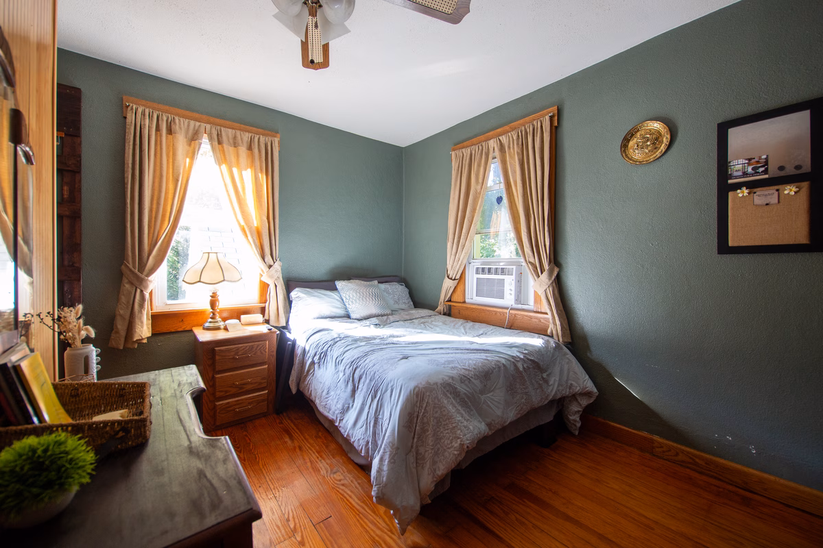 Bright furnished bedroom in a real SILK Homes property