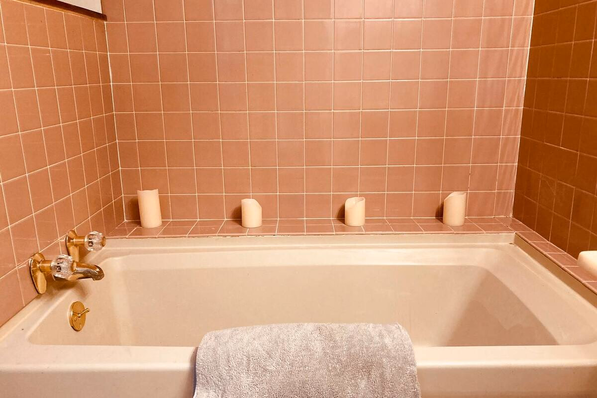 Clean tiled bathroom prepared for a comfortable SILK Homes stay