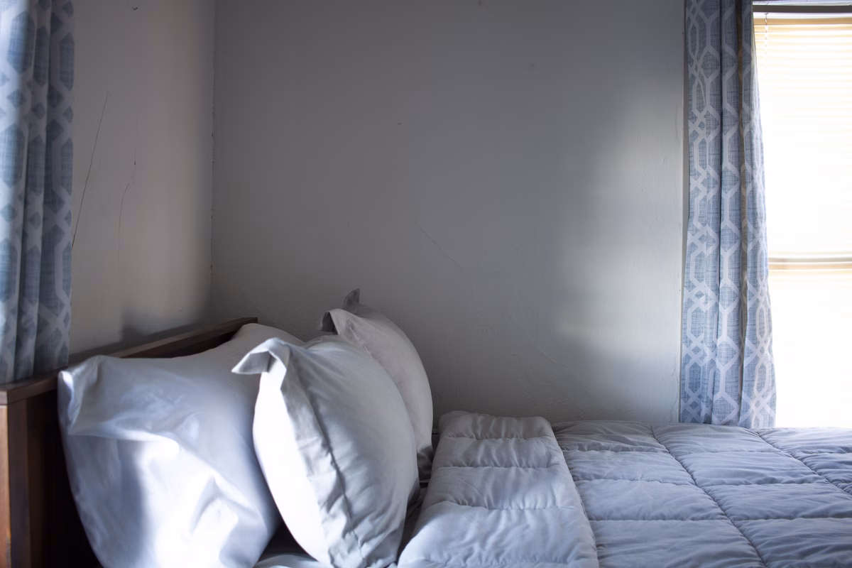 Bright furnished bedroom in a real SILK Homes property